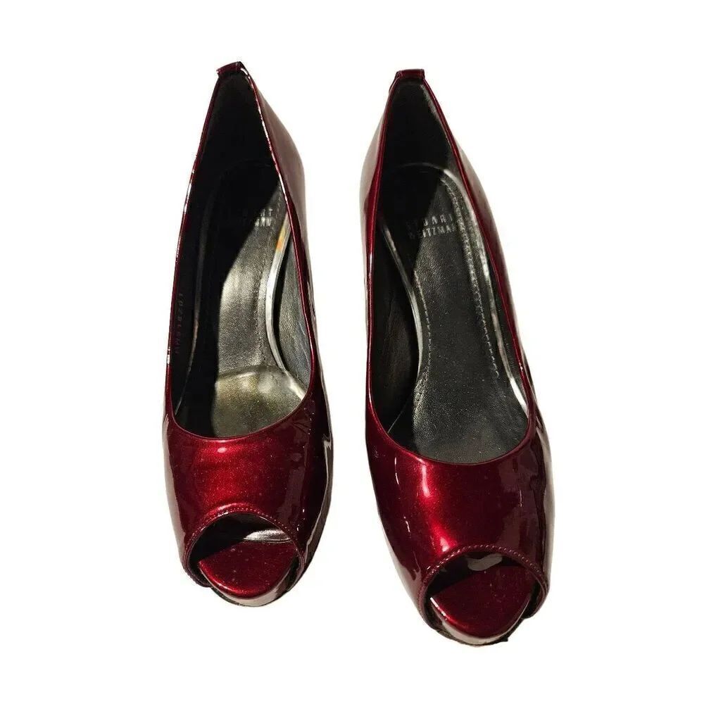 Stuart Weitzman burgundy red hidden platform peep toe pumps. Size 7.